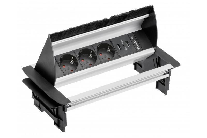 Presa di corrente attraverso la scrivania 1208958678